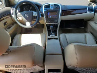 2008 Cadillac SRX RWD z VIN 1GYEE637780164161, wystawiony jako Copart lot #59238545 z przebiegiem 93 717 mil mil oraz Czysty tytuł • Clean title. Historia ofert i sprzedaży dostępna na DreamBid. Obrazek 8.