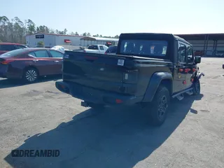 2022 Jeep Gladiator Texas Trail z VIN 1C6HJTAGXNL101704, wystawiony jako IAAI lot #41590378 z przebiegiem 29 299 mil mil oraz . Historia ofert i sprzedaży dostępna na DreamBid. Obrazek 4.