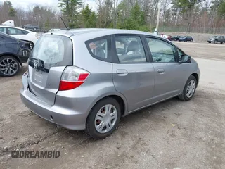 2010 Honda Fit with VIN JHMGE8H26AC001303, listed as a IAAI auction lot 42040111 with 129,949 mi miles. Bid and sale history available at carsss.com. Image 4.