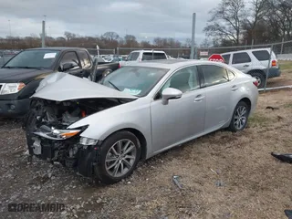 2016 Lexus ES 300h Hybrid with VIN JTHBW1GGXG2109451, listed as a IAAI auction lot 41168128 with 101,603 mi miles. Bid and sale history available at carsss.com. Image 17.