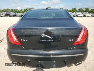 2014 Jaguar XJ with VIN SAJWA2GT0EMV61531, listed as a Copart auction lot 61071054 with 79,266 mi miles and Clean Title. Bid and sale history available at DreamBid. Image 6.