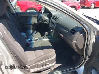 2012 Ford Fusion Hybrid z VIN 3FADP0L3XCR380817, wystawiony jako IAAI lot #42755712 z przebiegiem 81 220 mil mil oraz . Historia ofert i sprzedaży dostępna na DreamBid. Obrazek 5.