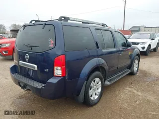 2007 Nissan Pathfinder S with VIN 5N1AR18U77C638404, listed as a IAAI auction lot 41560067 with 225,996 mi miles. Bid and sale history available at carsss.com. Image 4.