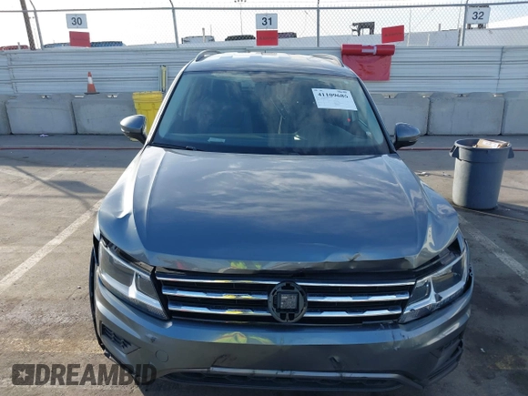 2021 Volkswagen Tiguan SE with VIN 3VV3B7AX8MM071303, listed as a IAAI auction lot 41109686 with 40,684 mi miles and . Bid and sale history available at DreamBid. Image 12.