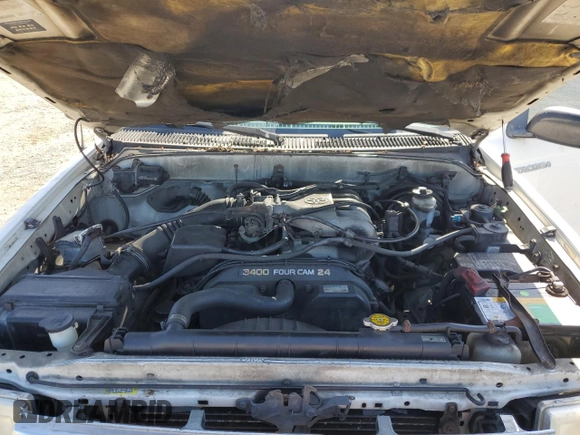 1999 Toyota Tacoma PreRunner with VIN 4TASN92N8XZ465120, listed as a Copart auction lot 54786825 with 320,970 mi miles and Salvage title. Bid and sale history available at DreamBid. Image 11.