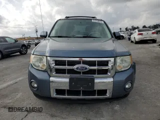 2010 Ford Escape Hybrid with VIN 1FMCU4K30AKC51022, listed as a Copart auction lot 51014615 with 128,275 mi miles and Salvage title. Bid and sale history available at DreamBid. Image 5.