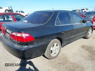 2000 Honda Accord EX z VIN JHMCG6672YC033056, wystawiony jako IAAI lot #41866960 z przebiegiem 217 289 mil mil oraz . Historia ofert i sprzedaży dostępna na DreamBid. Obrazek 4.