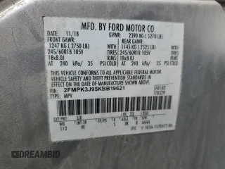 2019 Ford Edge SEL z VIN 2FMPK3J95KBB19621, wystawiony jako Copart lot #56135855 z przebiegiem 67 961 mil mil oraz Szkoda całkowita • Salvage title. Historia ofert i sprzedaży dostępna na DreamBid. Obrazek 14.