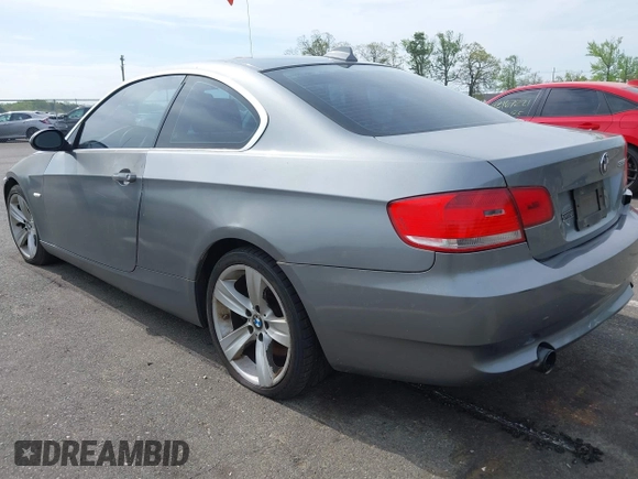 2009 BMW 3 Series 335i xDrive with VIN WBAWC73519E068547, listed as a IAAI auction lot 42168684 with 161,585 mi miles and . Bid and sale history available at carsss.com. Image 3.