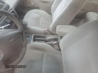 1998 Ford Contour z VIN 1FAFP65L6WK252432, wystawiony jako Copart lot #78490084 z przebiegiem Nie podano mil oraz Szkoda całkowita • Salvage title. Historia ofert i sprzedaży dostępna na DreamBid. Obrazek 8.