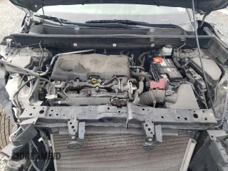 2019 Toyota RAV4 XLE with VIN JTMP1RFV9KD506960, listed as a Copart auction lot 50242025 with 102,157 mi miles and Salvage Title. Bid and sale history available at DreamBid. Image 13.