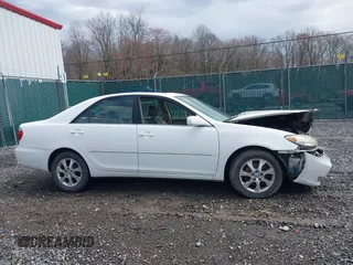 2005 Toyota Camry LE with VIN JTDBF30KX50165586, listed as a IAAI auction lot 41948322 with 84,326 mi miles and . Bid and sale history available at DreamBid. Image 13.