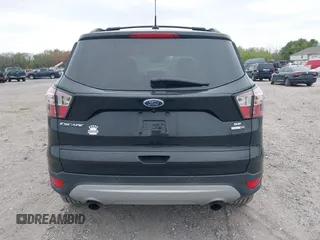 2017 Ford Escape SE with VIN 1FMCU9GD0HUC58128, listed as a IAAI auction lot 42078045 with 125,503 mi miles. Bid and sale history available at carsss.com. Image 16.