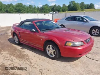 2001 Ford Mustang Deluxe z VIN 1FAFP44441F135562, wystawiony jako IAAI lot #42343630 z przebiegiem 156 394 mil mil oraz . Historia ofert i sprzedaży dostępna na DreamBid. Obrazek 1.