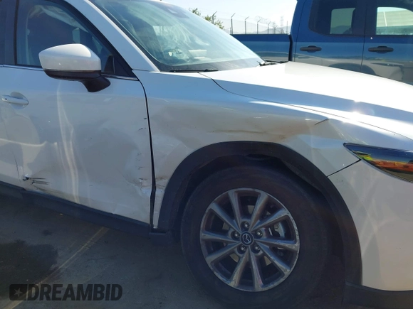 2022 Mazda CX-5 S Preferred with VIN JM3KFBCM2N0630148, listed as a IAAI auction lot 41986351 with 45,664 mi miles and . Bid and sale history available at carsss.com. Image 6.