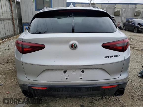 2019 Alfa Romeo Stelvio z VIN ZASPAJAN0K7C71850, wystawiony jako Copart lot #54234205 z przebiegiem Nie podano mil oraz Szkoda całkowita • Salvage title. Historia ofert i sprzedaży dostępna na DreamBid. Obrazek 6.