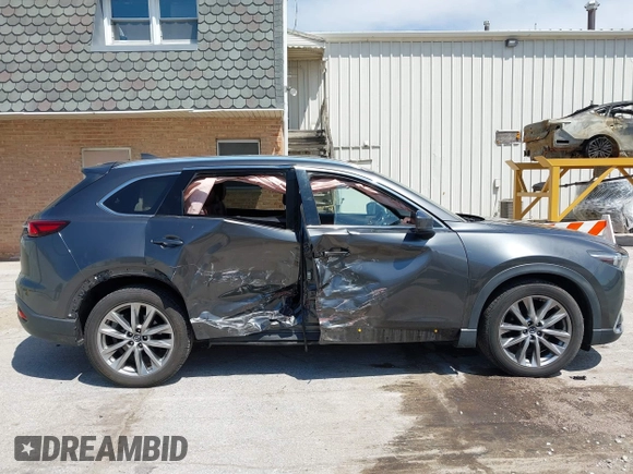 2016 Mazda CX-9 Signature with VIN JM3TCBEY2G0124433, listed as a IAAI auction lot 42194154 with 108,945 mi miles and . Bid and sale history available at DreamBid. Image 13.