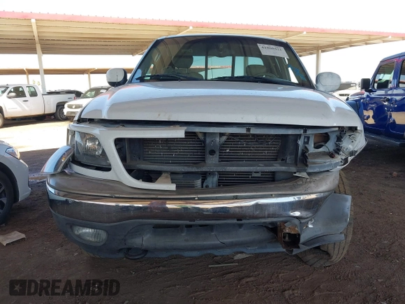 2003 Ford F-150 XL with VIN 1FTRX18L03NA45728, listed as a IAAI auction lot 41860421 with 179,596 mi miles. Bid and sale history available at carsss.com. Image 12.