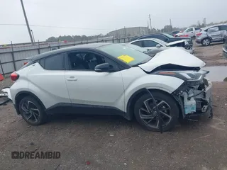 2021 Toyota C-HR LE with VIN NMTKHMBX4MR128066, listed as a IAAI auction lot 41102041 with 53,811 mi miles. Bid and sale history available at carsss.com. Image 14.