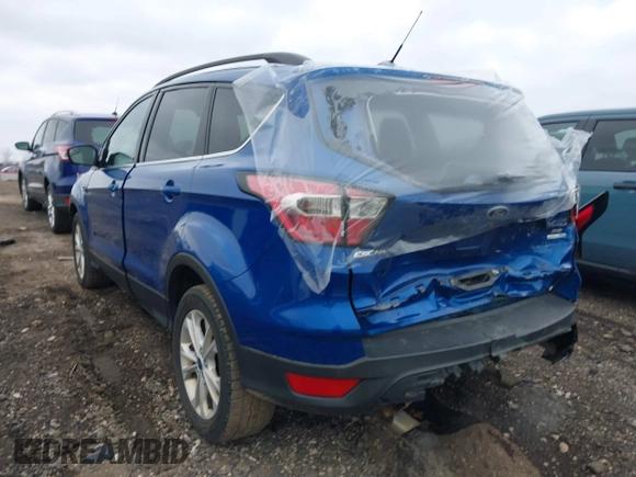 2017 Ford Escape SE with VIN 1FMCU9GD9HUE11122, listed as a IAAI auction lot 39049615 with 130,865 mi miles and . Bid and sale history available at DreamBid. Image 3.