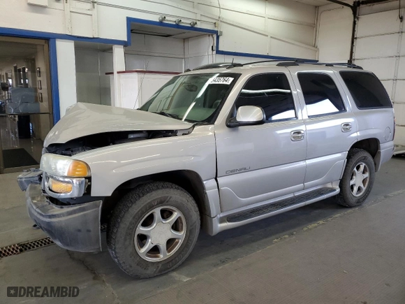 2005 GMC Yukon Denali with VIN 1GKEK63U25J140347, listed as a Copart auction lot 73435764 with 161,028 mi miles and Salvage Title. Bid and sale history available at carsss.com. Image 1.