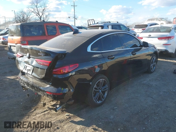 2021 BMW 2 Series 228i xDrive with VIN WBA73AK03M7H66827, listed as a IAAI auction lot 41682959 with 57,875 mi miles and . Bid and sale history available at DreamBid. Image 4.