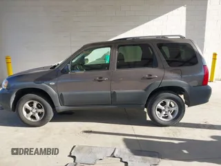 2006 Mazda Tribute i with VIN 4F2YZ02Z26KM12180, listed as a IAAI auction lot 41959606 with 228,217 mi miles and . Bid and sale history available at DreamBid. Image 14.