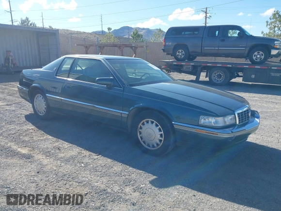 1993 Cadillac Eldorado ESC z VIN 1G6EL12Y4PU609197, wystawiony jako IAAI lot #41902066 z przebiegiem 96 251 mil mil oraz . Historia ofert i sprzedaży dostępna na DreamBid. Obrazek 1.