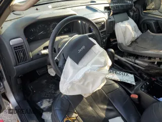 2004 Jeep Grand Cherokee Laredo z VIN 1J4GW48S84C200617, wystawiony jako Copart lot #51732045 z przebiegiem 171 452 mil mil oraz Nie do naprawy • Non repairable. Historia ofert i sprzedaży dostępna na DreamBid. Obrazek 8.