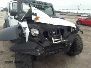 2016 Jeep Wrangler Unlimited Sport with VIN 1C4BJWDGXGL335825, listed as a IAAI auction lot 28960589 with 28,515 mi miles and . Bid and sale history available at DreamBid. Image 6.