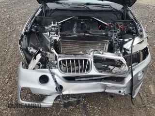 2017 BMW X5 sDrive35i with VIN 5UXKR2C36H0X04777, listed as a Copart auction lot 87718635 with 0 mi miles and Salvage Title. Bid and sale history available at carsss.com. Image 12.