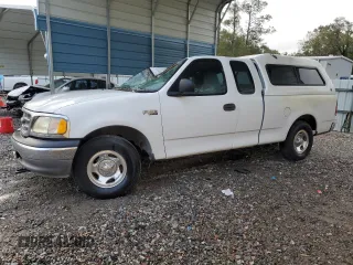2002 Ford F-150 XL with VIN 1FTRX17212NB22954, listed as a Copart auction lot 80843964 with 216,949 mi miles and Non Repairable. Bid and sale history available at carsss.com. Image 1.