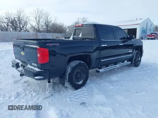2015 Chevrolet Silverado 1500 High Country with VIN 3GCUKTEC0FG148198, listed as a IAAI auction lot 41493933 with 164,453 mi miles and . Bid and sale history available at DreamBid. Image 4.