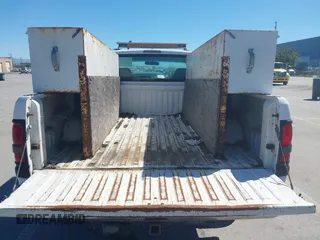 2000 Dodge Ram 2500 with VIN 3B7KC26Z4YM241862, listed as a IAAI auction lot 41862536 with 77,280 mi miles. Bid and sale history available at carsss.com. Image 8.