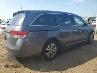 2014 Honda Odyssey EX-L with VIN 5FNRL5H61EB046093, listed as a Copart auction lot 61930335 with Not provided miles and Salvage title. Bid and sale history available at DreamBid. Image 3.