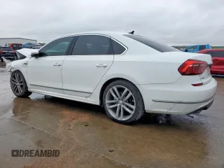 2017 Volkswagen Passat R-Line z VIN 1VWDT7A39HC074471, wystawiony jako Copart lot #51965305 z przebiegiem 63 152 mil mil oraz Szkoda całkowita • Salvage title. Historia ofert i sprzedaży dostępna na DreamBid. Obrazek 2.