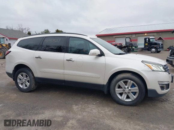 2013 Chevrolet Traverse LT with VIN 1GNKVGKD6DJ157719, listed as a IAAI auction lot 41987527 with 148,486 mi miles and . Bid and sale history available at DreamBid. Image 14.