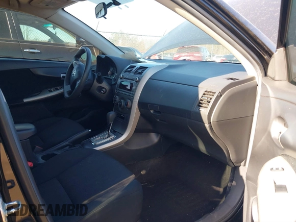2011 Toyota Corolla L with VIN 2T1BU4EE4BC714196, listed as a IAAI auction lot 41759473 with 128,946 mi miles. Bid and sale history available at carsss.com. Image 5.