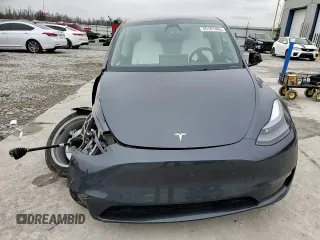 2023 Tesla Model Y Long Range z VIN 7SAYGDEE8PF884567, wystawiony jako Copart lot #45181465 z przebiegiem 16 653 mil mil oraz Szkoda całkowita • Salvage title. Historia ofert i sprzedaży dostępna na DreamBid. Obrazek 11.