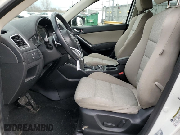 2016 Mazda CX-5 Touring with VIN JM3KE4CY7G0821701, listed as a Copart auction lot 43805495 with 144,416 mi miles and Salvage Title. Bid and sale history available at carsss.com. Image 7.