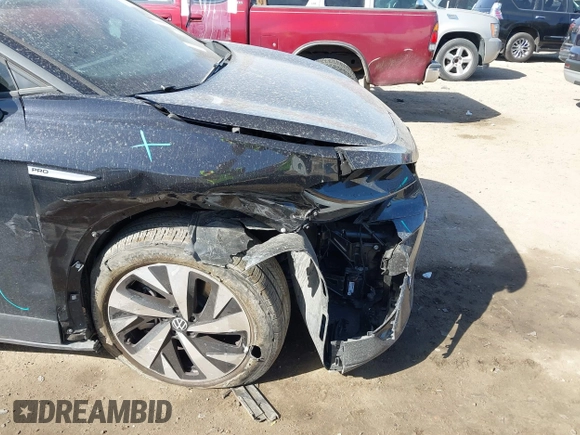 2023 Volkswagen ID.4 Pro with VIN 1V2CMPE82PC008195, listed as a IAAI auction lot 41828830 with 32,336 mi miles and . Bid and sale history available at DreamBid. Image 19.