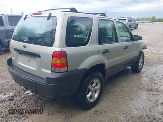 2006 Ford Escape XLS with VIN 1FMYU02ZX6KA73663, listed as a IAAI auction lot 42177043 with 230,878 mi miles and . Bid and sale history available at DreamBid. Image 4.