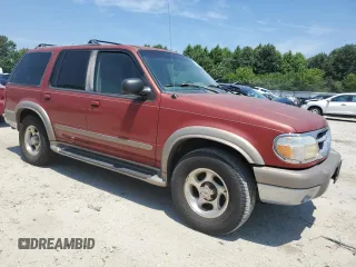 1999 Ford Explorer XLT with VIN 1FMZU32E7XZA41913, listed as a Copart auction lot 50699425 with 210,163 mi miles and Clean title. Bid and sale history available at DreamBid. Image 4.