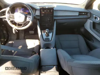 2023 Polestar 2 z VIN YSMEG3KA6PL141533, wystawiony jako Copart lot #77271484 z przebiegiem 45 533 mil mil oraz Czysty tytuł • Clean title. Historia ofert i sprzedaży dostępna na DreamBid. Obrazek 8.