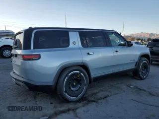 2025 Rivian R1S Adventure with VIN 7PDSGBBA0SN051096, listed as a Copart auction lot 87441054 with 30 mi miles and Salvage Title. Bid and sale history available at carsss.com. Image 3.
