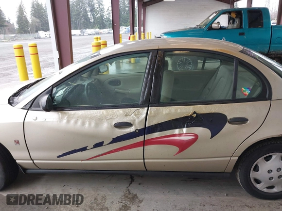 2002 Saturn SL z VIN 1G8ZH52852Z155698, wystawiony jako IAAI lot #41712058 z przebiegiem 90 150 mil mil oraz . Historia ofert i sprzedaży dostępna na DreamBid. Obrazek 6.