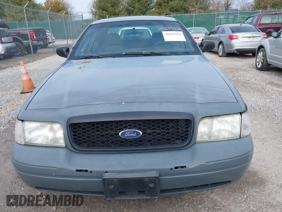 2007 Ford Police Interceptor z VIN 2FAFP71W37X112195, wystawiony jako IAAI lot #41695226 z przebiegiem 140 188 mil mil oraz . Historia ofert i sprzedaży dostępna na DreamBid. Obrazek 12.