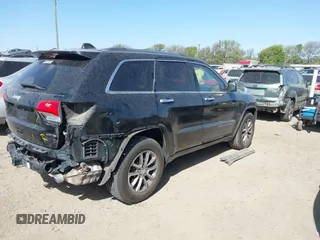 2014 Jeep Grand Cherokee Limited with VIN 1C4RJEBM4EC353610, listed as a IAAI auction lot 41830079 with 168,160 mi miles. Bid and sale history available at carsss.com. Image 4.