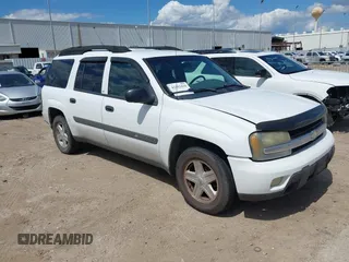 2003 Chevrolet TrailBlazer EXT LT with VIN 1GNES16S536229622, listed as a IAAI auction lot 42212434 with 302,884 mi miles and . Bid and sale history available at DreamBid. Image 1.