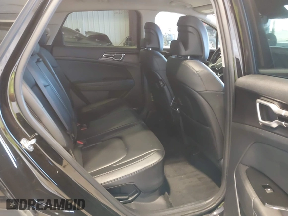 2023 Kia Sportage EX with VIN KNDPVCAG8P7095454, listed as a IAAI auction lot 42335661 with 96,718 mi miles and . Bid and sale history available at DreamBid. Image 8.